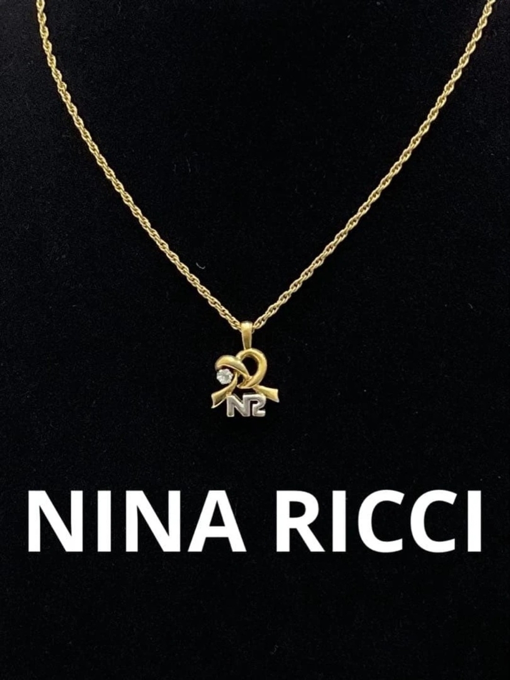 Nina Ricci Gold-Tone Ribbon 'NR' Pendant Necklace w/ Crystal Accent